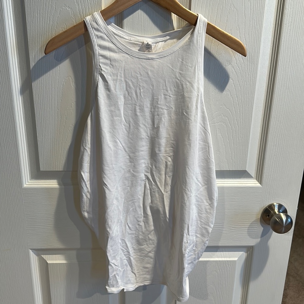 White Lululemon tank top with cut out detail in the back